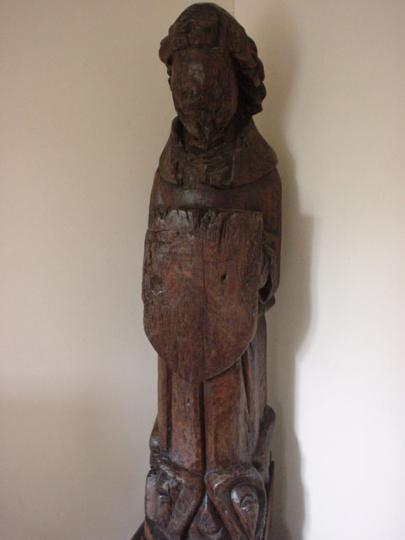 English medieval oak roof angel defaced in antiquity