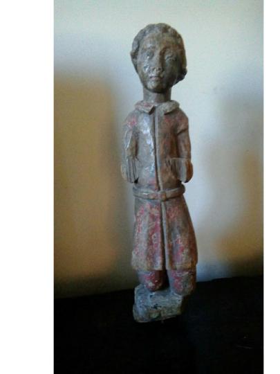 English fifteenth century oak carving of a young boy