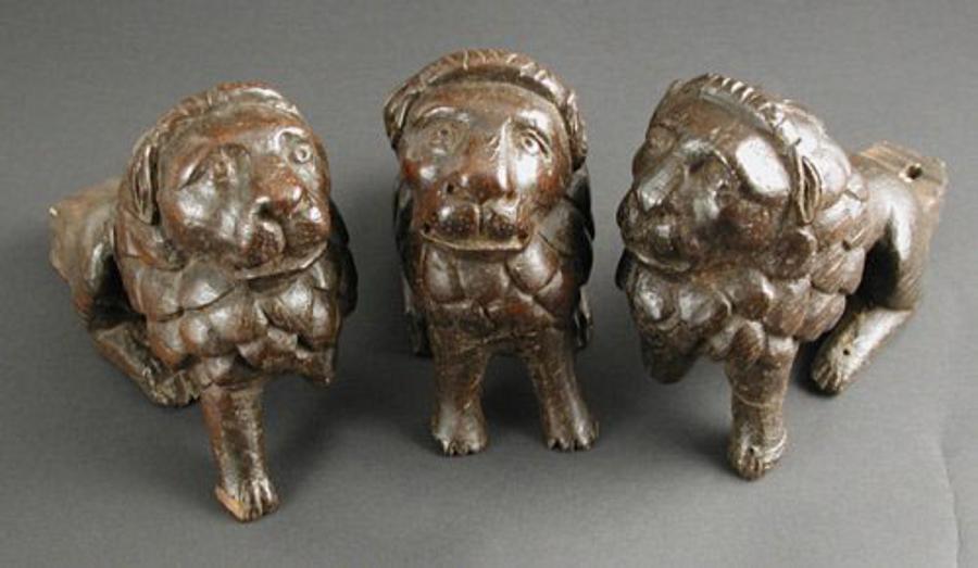 English fifteenth century oak carvings of lions from the feet of a lectern