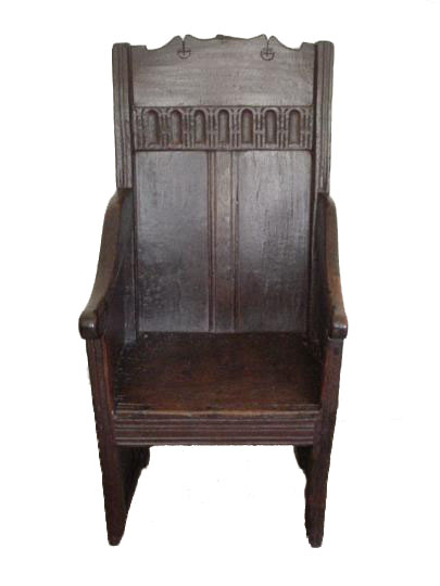 English fifteenth century oak enclosed panelled armed chair