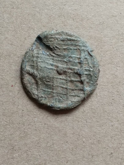 Hnefatafl Game Piece depicting a Game Board---A King Piece?