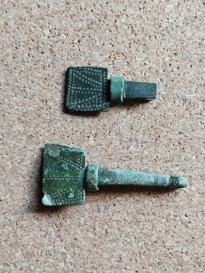 Two manuscript page markers and/or hangers